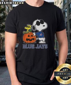 Awesome Snoopy Toronto Blue Jays MLB pumpkin Halloween Peanuts cartoon t-shirt for 2025, perfect for baseball fans.
