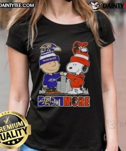 Awesome Snoopy X Charlie Brown Baltimore Sports Ravens X Orioles skyline ladies tee featuring iconic characters.