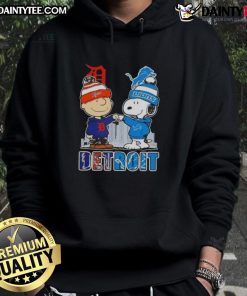 Awesome Snoopy X Charlie Brown hoodie featuring Detroit Tigers and Lions skyline design, perfect for sports fans.