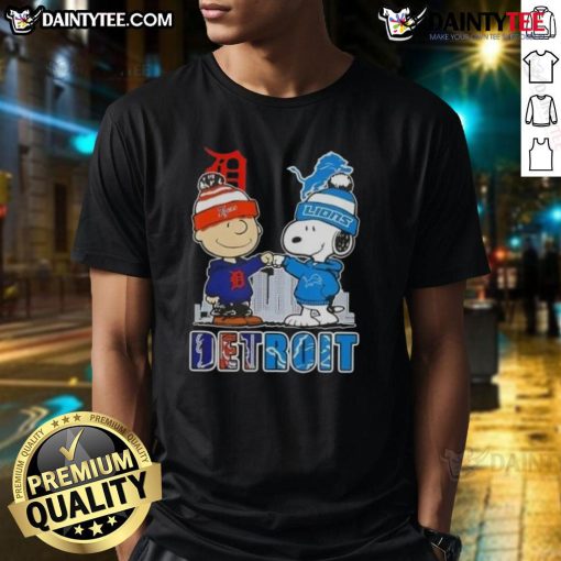 Alt Text: Awesome Snoopy X Charlie Brown Detroit Sports Tigers X Lions Skyline T-Shirt featuring iconic characters and city skyline.
