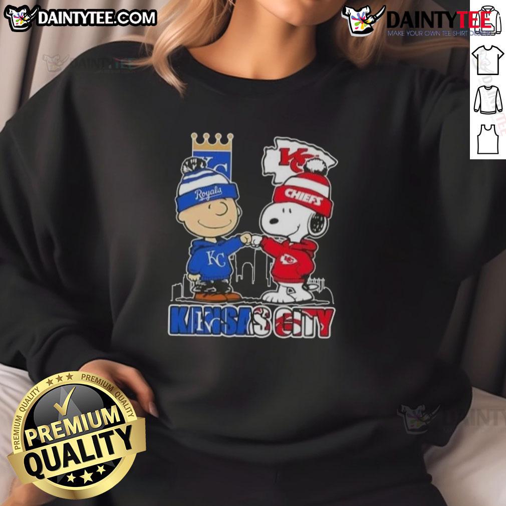 Awesome Snoopy X Charlie Brown Kansas City Sports Royals X Chiefs Skyline Sweatshirt Awesome Snoopy X Charlie Brown Kansas City Sports Royals X Chiefs Skyline Sweatshirt showcasing iconic characters and city skyline.