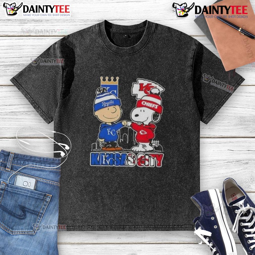 Awesome Snoopy X Charlie Brown Kansas City Sports Royals X Chiefs Skyline Washed T-Shirt Alt Text: Awesome Snoopy X Charlie Brown Kansas City Royals X Chiefs skyline washed t-shirt design featuring iconic characters.