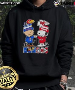 Awesome Snoopy X Charlie Brown hoodie featuring Kansas Sports Jayhawks and Chiefs skyline design.