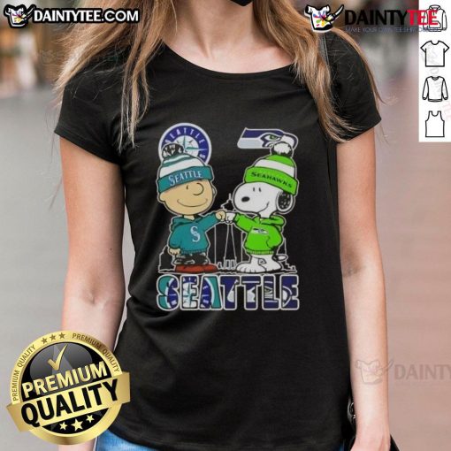 Awesome Snoopy X Charlie Brown Seattle sports tee featuring Mariners and Seahawks skyline design for ladies.