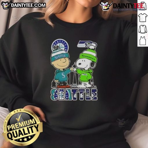 Alt Text: Awesome Snoopy X Charlie Brown Seattle Sports sweatshirt featuring Mariners and Seahawks skyline design.