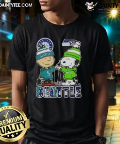 Alt Text: Awesome Snoopy X Charlie Brown Seattle Sports Mariners X Seahawks Skyline T-Shirt featuring iconic characters and city skyline.