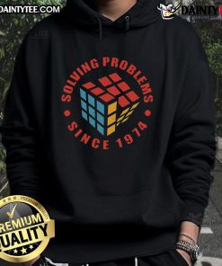 Awesome Solving Problems Since 1974 Rubik Cube Retro Hoodie featuring a colorful design and classic puzzle graphic.