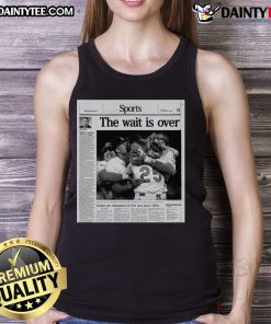 Indians celebrate their first championship win since 1954 in an 'Awesome Sports' tank top, showcasing team pride.