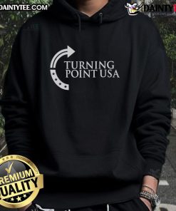 Sydney Sweeney wearing an Awesome Turning Point USA logo hoodie, showcasing a stylish and bold statement.