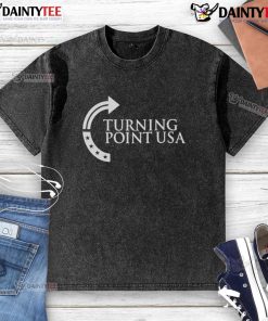 Alt Text: Sydney Sweeney in a stylish washed t-shirt featuring the Turning Point USA logo for a trendy casual look.