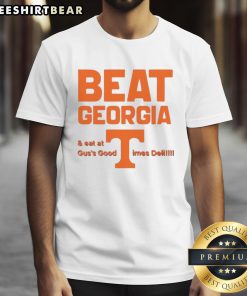 Alt Text: Tennessee Volunteers fans celebrating victory over Georgia in 'Eat Gus's Good Times Deli' T-shirt.
