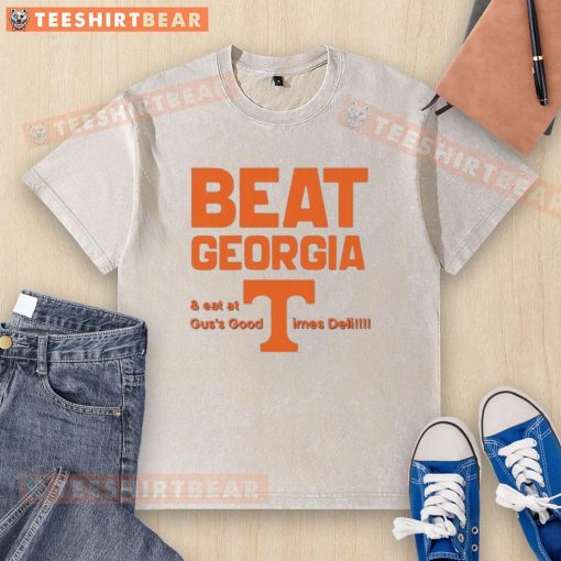 Awesome Tennessee Volunteers beat Georgia, showcasing a washed T-shirt from Gus's Good Times Deli in celebration.
