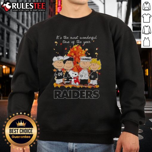 Awesome Peanuts character sweatshirt featuring Las Vegas Raiders design for the holiday season. Perfect for winter wear!