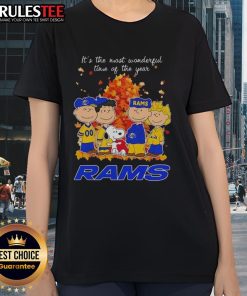 Awesome Peanuts character graphic on Los Angeles Rams ladies tee for the holiday season - perfect festive apparel.