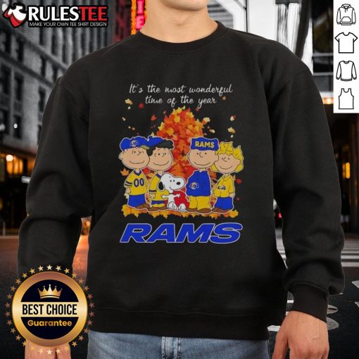 Alt Text: Awesome Peanuts character sweatshirt for Los Angeles Rams, celebrating the holiday season with festive cheer.