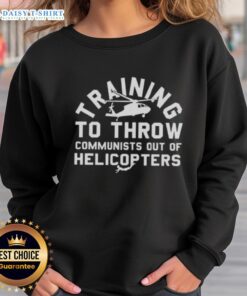 Awesome Training to Throw Communists Out of Helicopters sweatshirt design featuring bold graphics and a casual style.