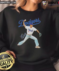 Alt Text: Awesome V BTS x Los Angeles Dodgers sweatshirt in baseball throwing position, showcasing signature style.