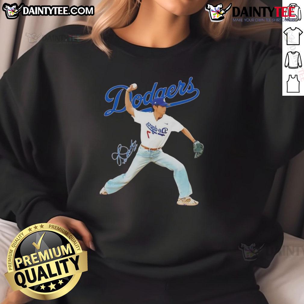 Awesome V BTS x Los Angeles Dodgers Baseball throwing Position Signature Sweatshirt Alt Text: Awesome V BTS x Los Angeles Dodgers sweatshirt in baseball throwing position, showcasing signature style.