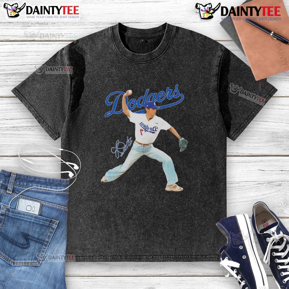 Awesome V BTS x Los Angeles Dodgers Baseball throwing Position Signature Washed T-Shirt Alt Text: Awesome V BTS x Los Angeles Dodgers t-shirt featuring a baseball throwing position design, perfect for fans.
