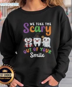 Halloween sweatshirt featuring a spooky design that says 'We Take The Scary Out Of Your Smile' for festive fun.