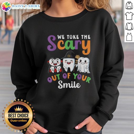 Halloween sweatshirt featuring a spooky design that says 'We Take The Scary Out Of Your Smile' for festive fun.