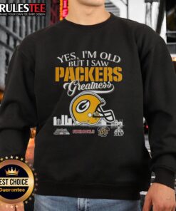 Vintage Green Bay Packers sweatshirt featuring Super Bowl helmet and skyline, celebrating timeless team greatness.