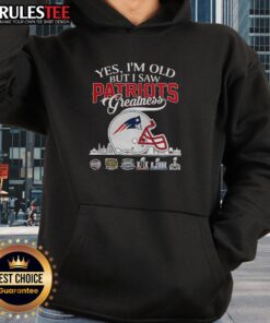 New England Patriots hoodie featuring Super Bowl helmet and skyline, perfect for fans celebrating team greatness.