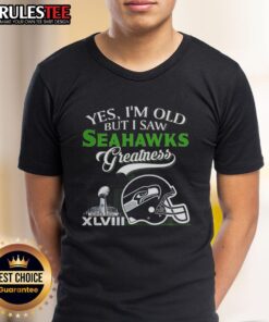 Seattle Seahawks Super Bowl helmet and skyline graphic on 'Awesome Yes Im Old' t-shirt for fans of football greatness.