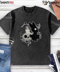 Alt Text: Cute bunny Halloween candle skull design on a washed t-shirt, perfect for festive fall fashion.