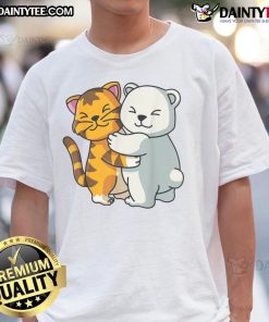 Adorable cartoon of a cute cat and bear hugging, featured on a charming animal friendship T-shirt design.