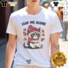 Cute cat graphic on a Leaf Me Alone This Fall t-shirt, perfect for autumn lovers and feline enthusiasts.