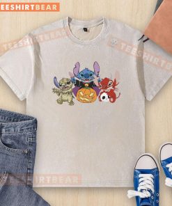 Alt Text: Cute Halloween Stitch characters on a washed t-shirt featuring a pumpkin, mummy, vampire, and devil design.