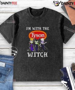 Cute 'I'm With The Tyson Foods Witch' Halloween washed t-shirt featuring playful villain graphics for festive fun.