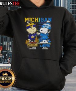 Alt Text: Cute Michigan sports hoodie featuring Charlie Brown Wolverines for Saturdays and Snoopy Detroit Lions for Sundays.