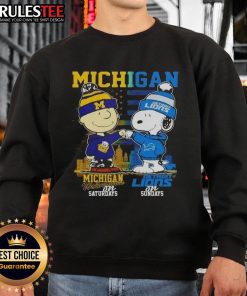 Alt Text: Cute Michigan sports sweatshirt featuring Charlie Brown Wolverines for Saturdays and Snoopy Detroit Lions for Sundays.