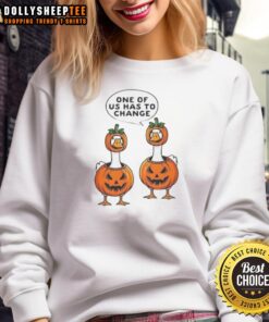 Alt Text: Cute Halloween sweatshirt featuring geese in pumpkin costumes, perfect for festive celebrations and cozy fall outings.