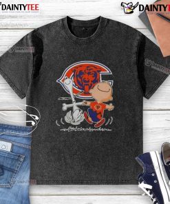 Alt Text: Cute Peanuts Snoopy and Charlie Brown Chicago Bears football washed t-shirt, perfect for fans and casual wear.