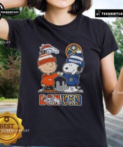 Alt Text: Cute Snoopy and Charlie Brown graphic on a Denver sports Broncos x Nuggets skyline ladies tee shirt.