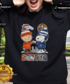 Alt Text: Cute Snoopy and Charlie Brown Denver Sports sweatshirt featuring Broncos and Nuggets skyline design.
