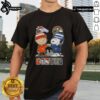 Alt Text: Cute Snoopy and Charlie Brown Denver Sports Broncos X Nuggets skyline t-shirt featuring iconic characters and city backdrop.