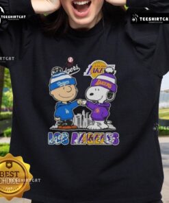 Alt Text: Cute Snoopy and Charlie Brown sweatshirt featuring Los Angeles Dodgers and Lakers skyline design.
