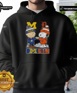 Cute Snoopy and Charlie Brown in Michigan sports hoodie featuring Wolverines and Detroit Tigers skyline design.