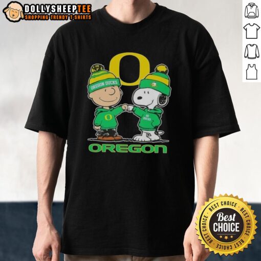 Alt Text: Cute Snoopy and Charlie Brown in Oregon Ducks football gear on a skyline t-shirt design, perfect for fans.