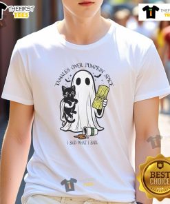 Alt Text: Cute tamales on a pumpkin spice background featuring a Halloween retro T-shirt design with I Said What I Said.