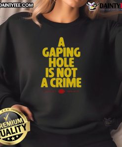 Alt Text: Funny A Gaping Hole Is Not A Crime Sweatshirt, featuring humorous text design on a cozy gray background.
