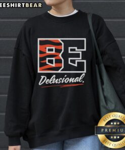 Alt Text: Funny Be Delusional Cincinnati Bengals sweatshirt featuring bold graphics, perfect for fans with a sense of humor.
