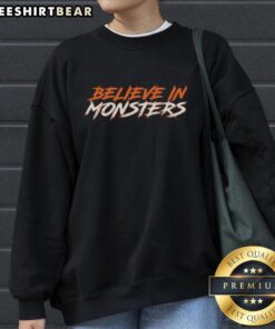 Funny Believe In Monsters Chicago Bears sweatshirt featuring a playful graphic, perfect for fans and cozy wear.