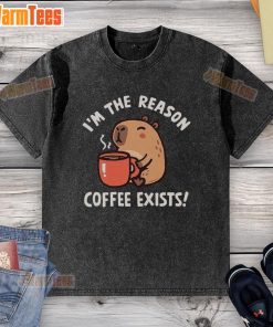 Funny capybara graphic on a washed t-shirt with the text 'I'm the reason coffee exists' - perfect for coffee lovers.