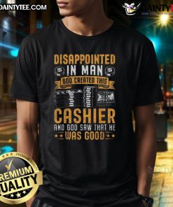 Funny cashier shirt featuring a disappointed cashier graphic with the text 'God created this cashier' for humor lovers.