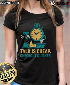 Funny cashier at grocery store with 'Talk Is Cheap, Checkout Quicker' tee, showcasing humor in retail work.